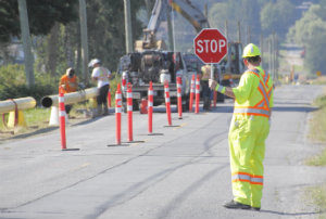 Construction Work zone safety motorist safety dangers and hazards traffic patterns navigating around barrels motorists and workers